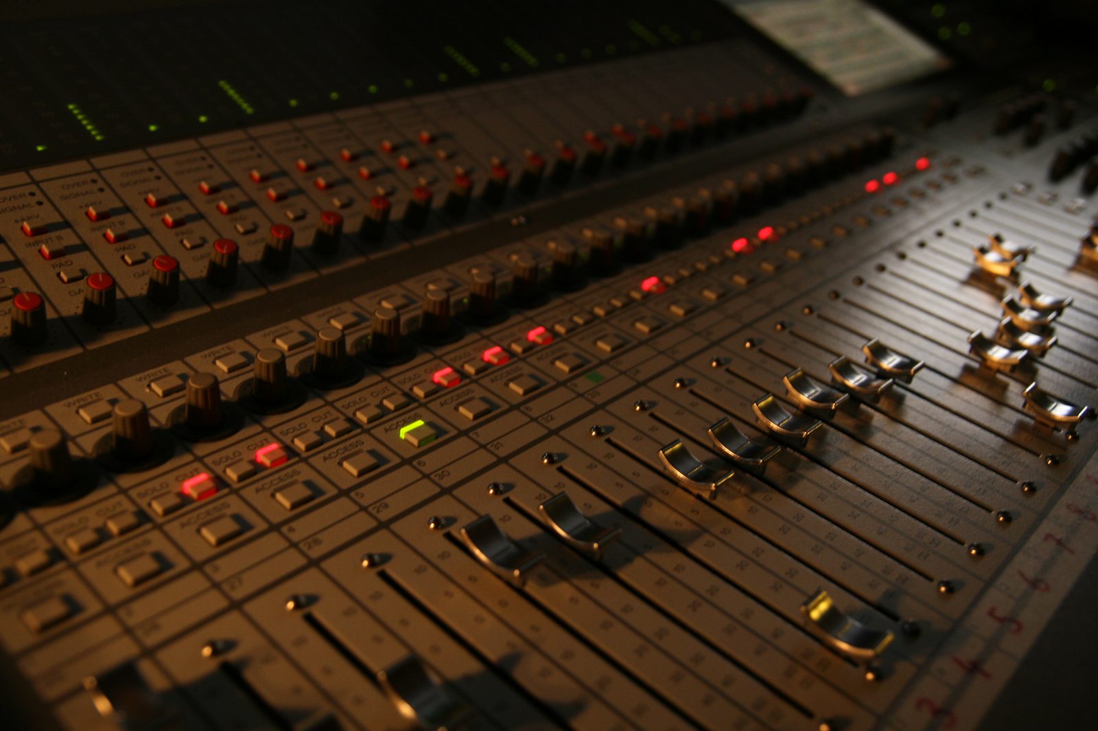 Mixing console, close-up of the faders